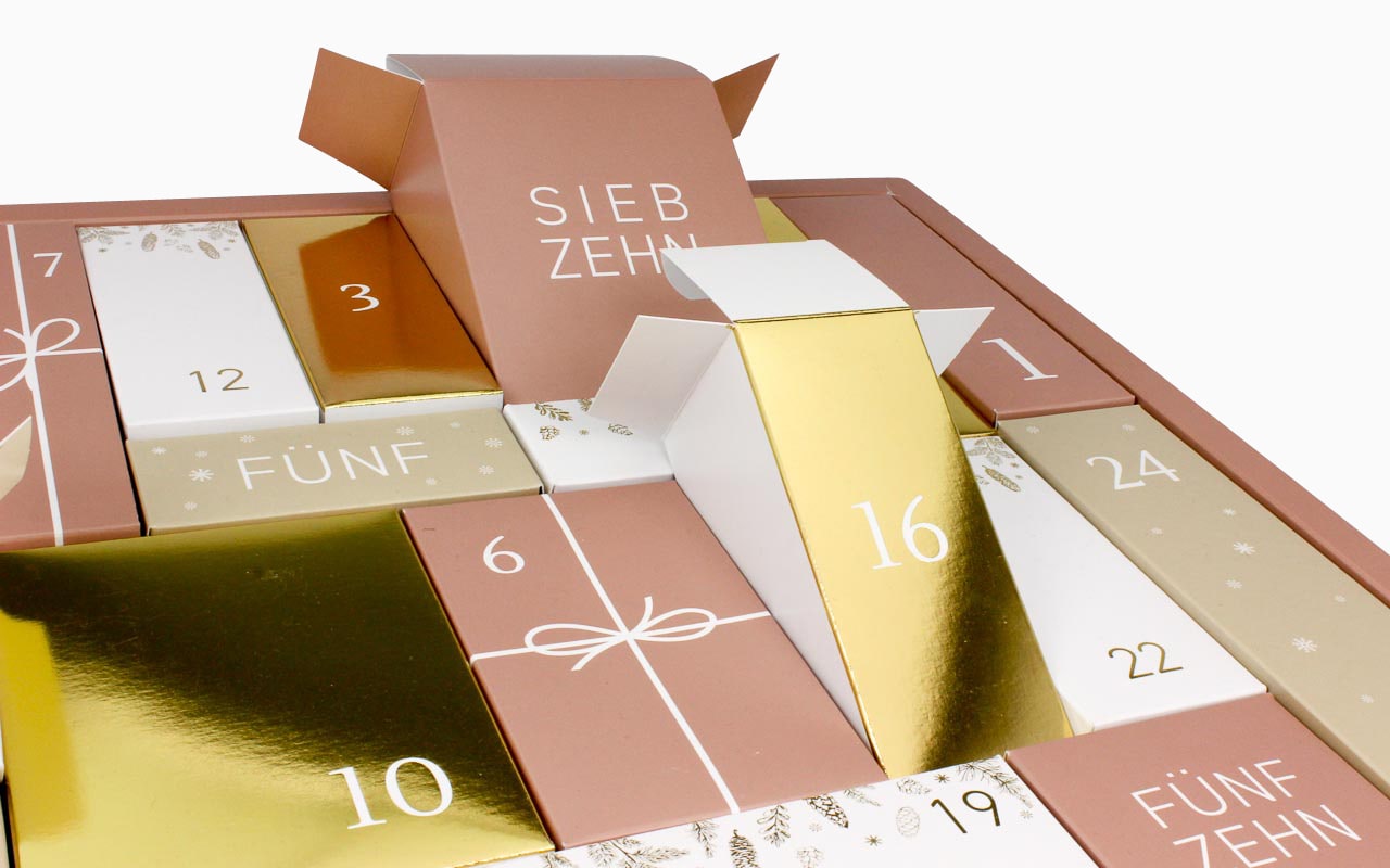 Adventskalender mit Faltschachteln + Heißfolie